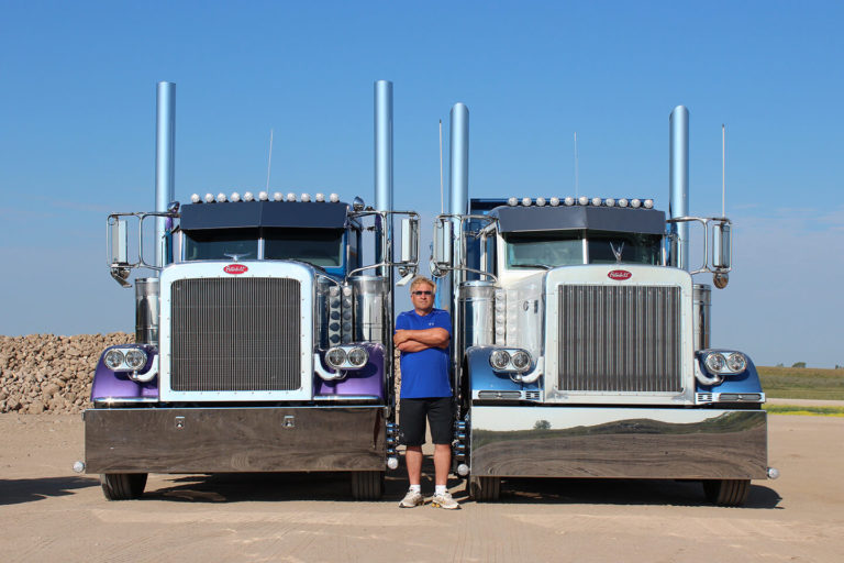 Lorne Pictured with Two Custom Peterbilt Daycabs