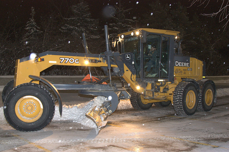 Snow removal for commercial properties require larger heavy equipment like motor graders.