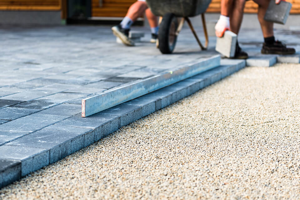 Brick driveway on top of rock dust.