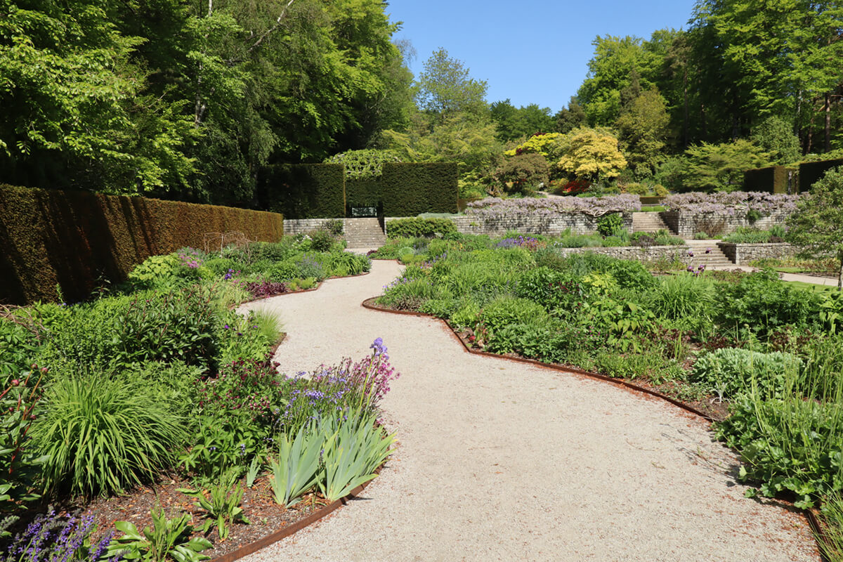 Irregularly shaped gravel pathway.