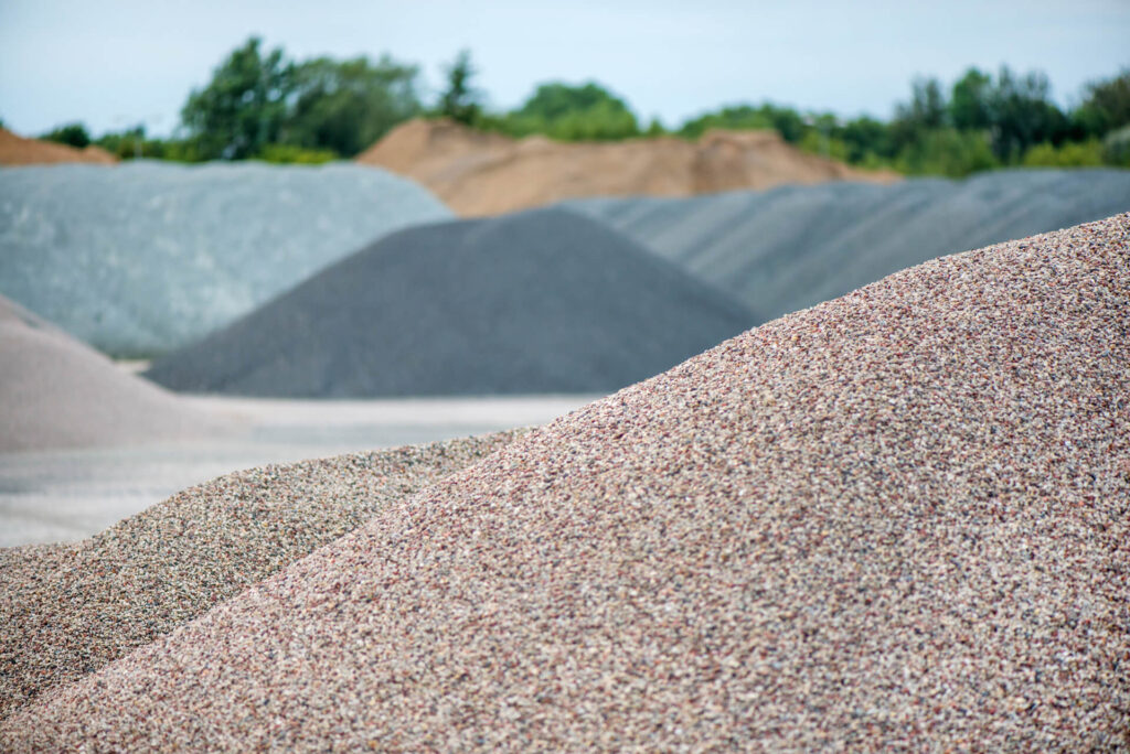 PIles of various types of gravel.