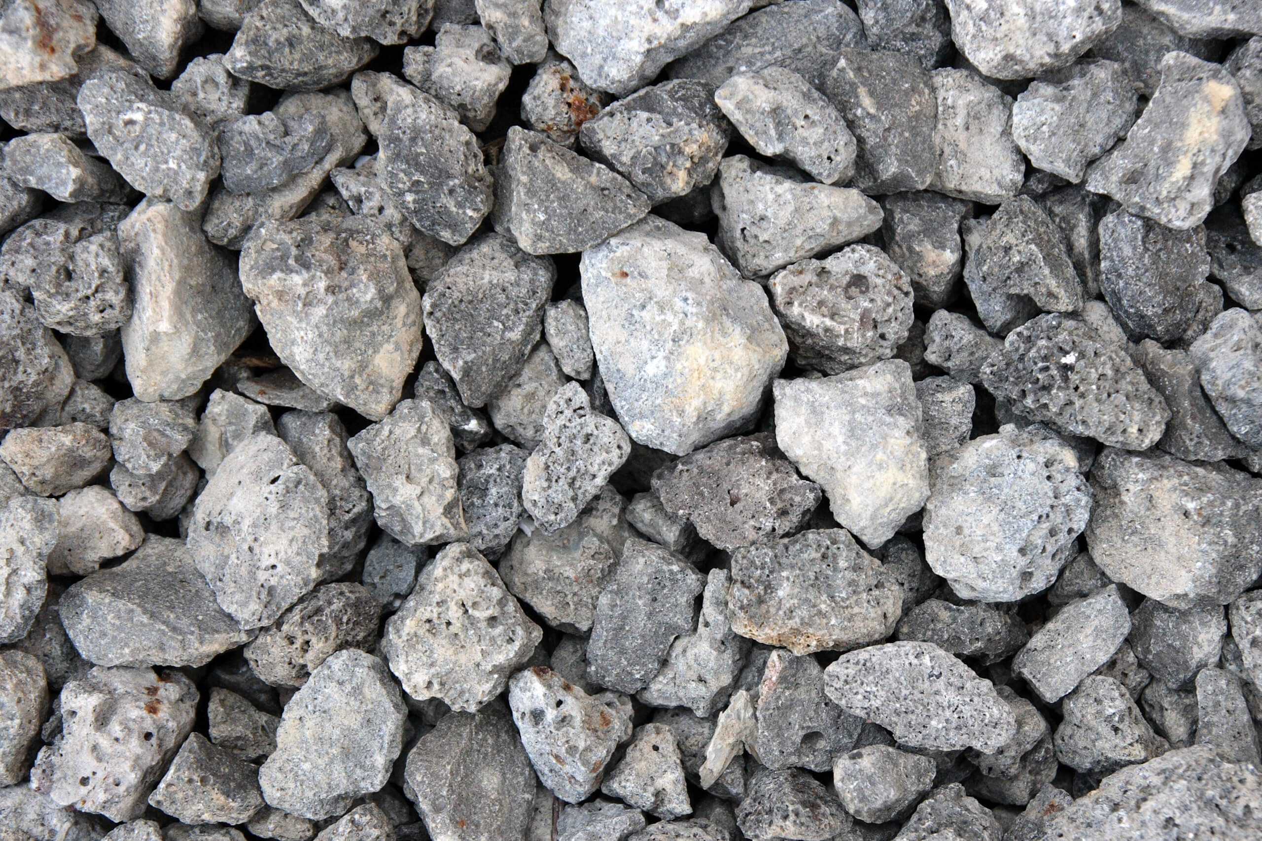 Once cooled and processed, slag becomes a hard, angular aggregate ready for construction use.